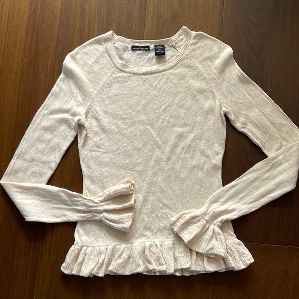 Moda International peplum cashmere sweater